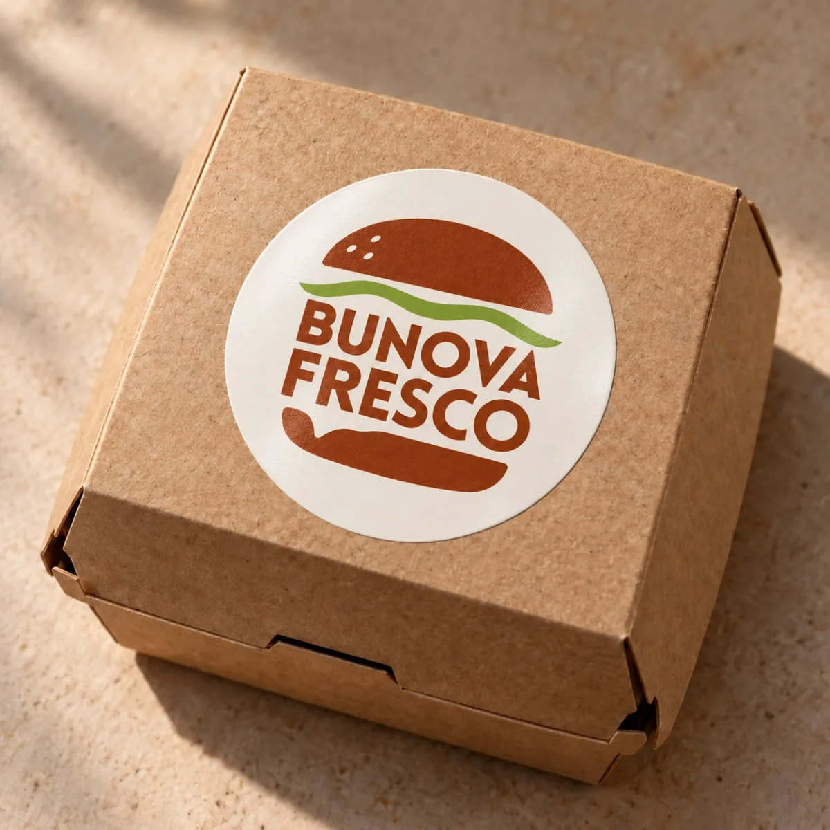 Bunova Fresco logo sticker on a kraft takeout box
