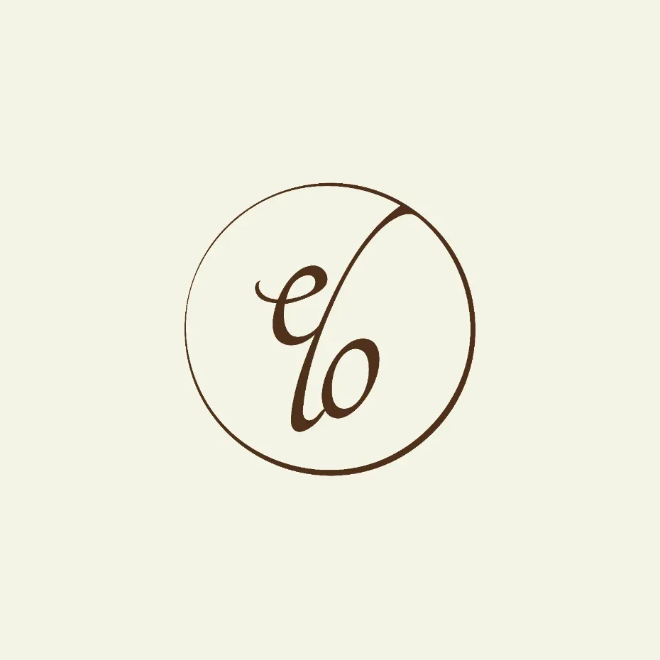 elo café monogram logo in brown inside a thin circle, on cream